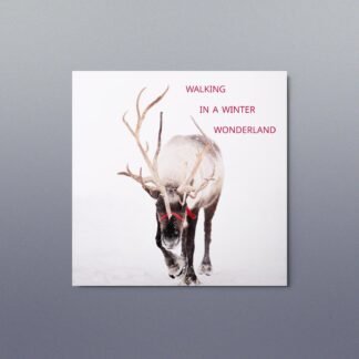 Reindeer Walking in a Winter Wonderland Metal Print
